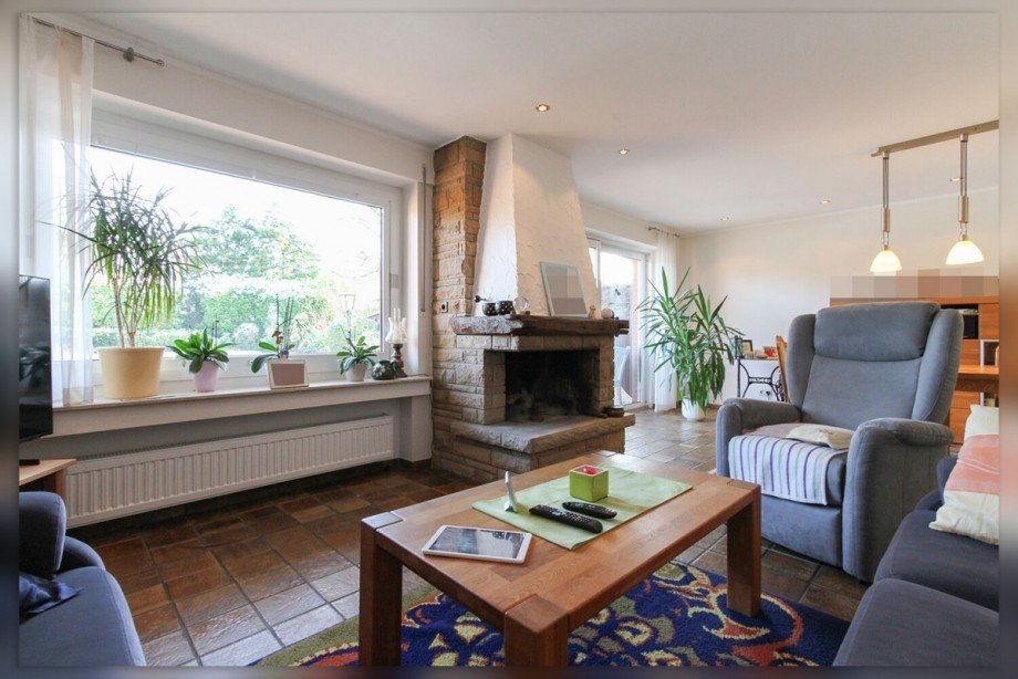 Wohnbereich mit Kamin EG Zweifamilienhaus Heiden