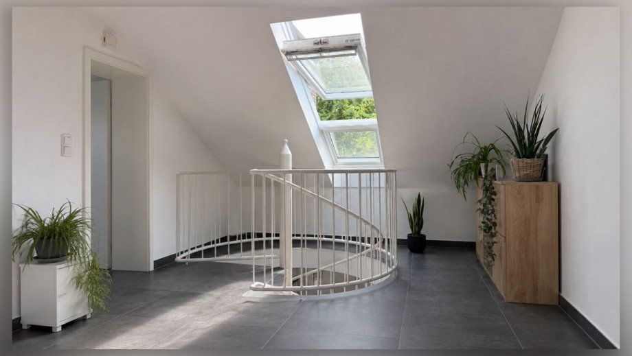 Wendeltreppe im Dachgeschoss Maisonettewohnung Heiden