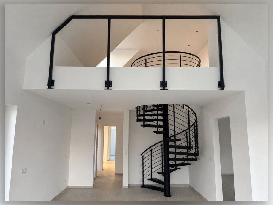 Wohnbereich mit Galerie und Wendeltreppe Maisonettewohnung Borken